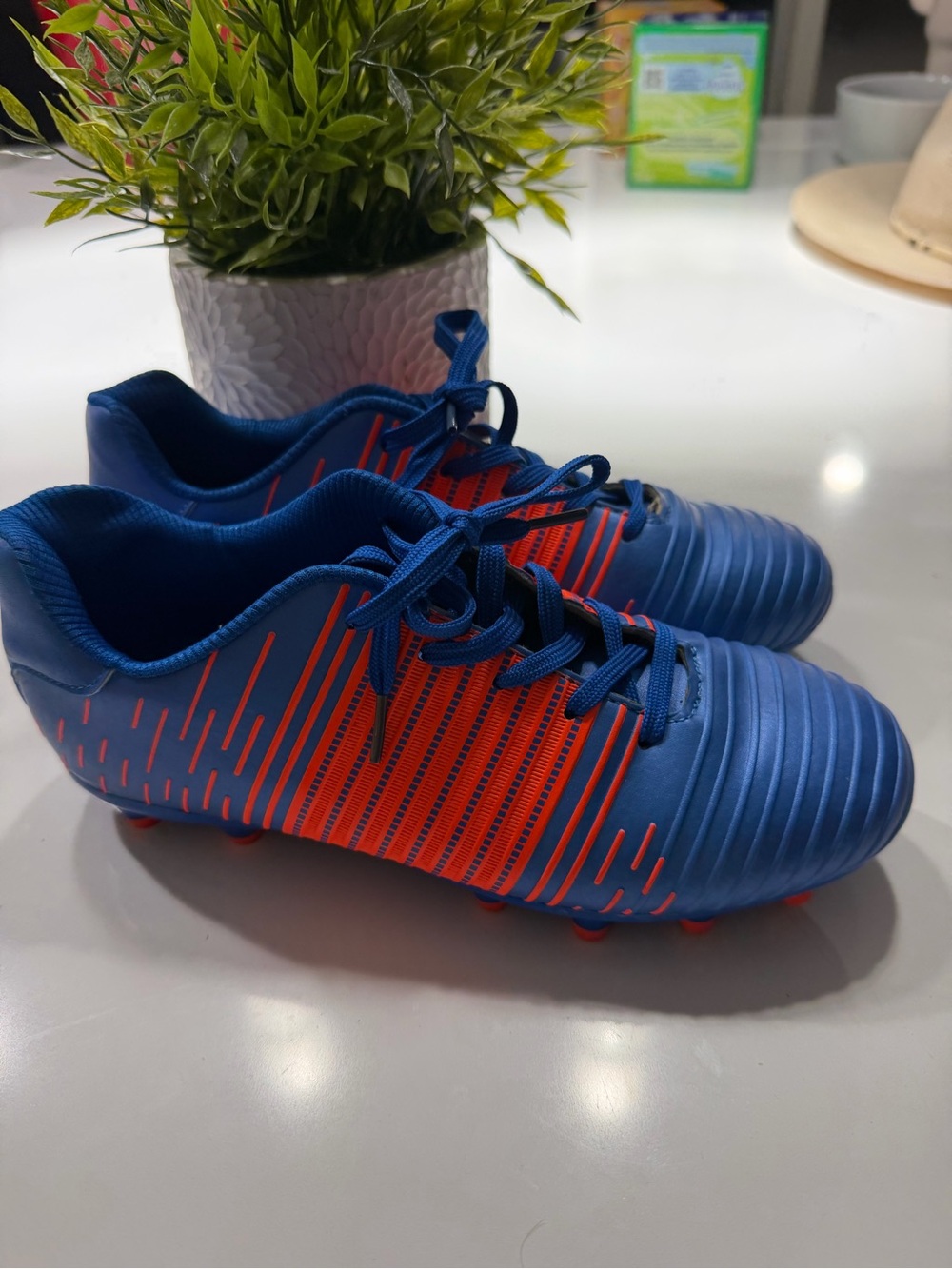 Kids Blue and Orange Soccer Cleats